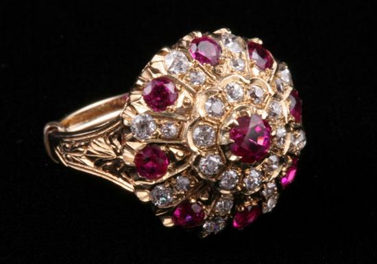 Appraisal: K YELLOW GOLD DIAMOND AND RUBY DOME RING Brilliant-cut round