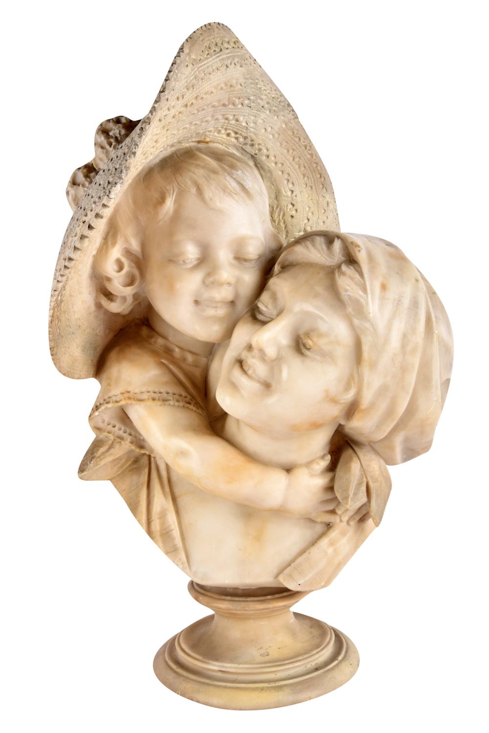 Appraisal: ALABASTER FIGURAL GROUPdepicting mother and child Condition with some discoloration