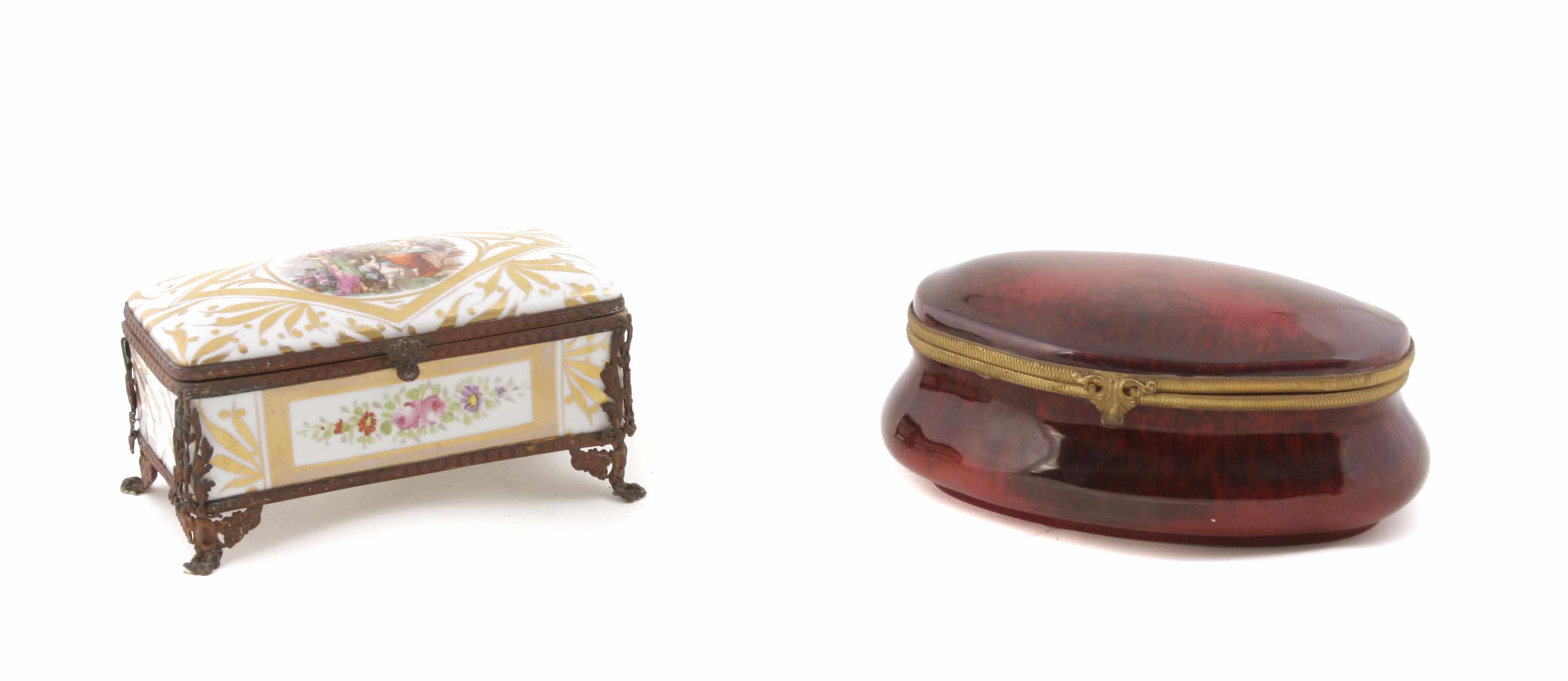 Appraisal: Two Svres style gilt metal mounted porcelain table boxes Comprising