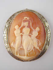 Appraisal: A silver mounted carved shell cameo brooch of the three