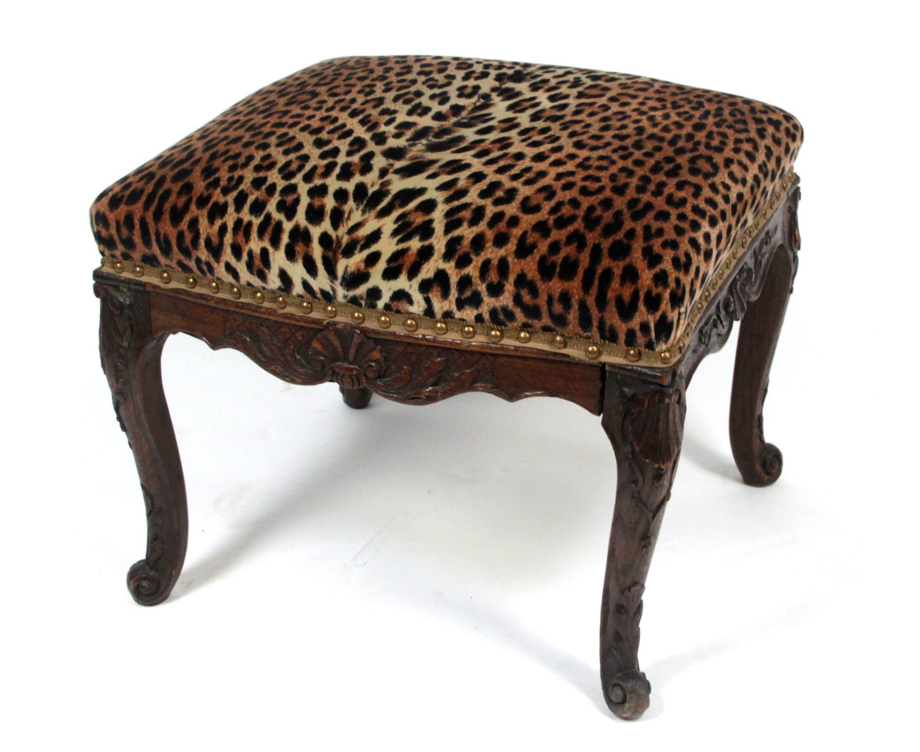 Appraisal: An th Century style French walnut stool with carved cabriole