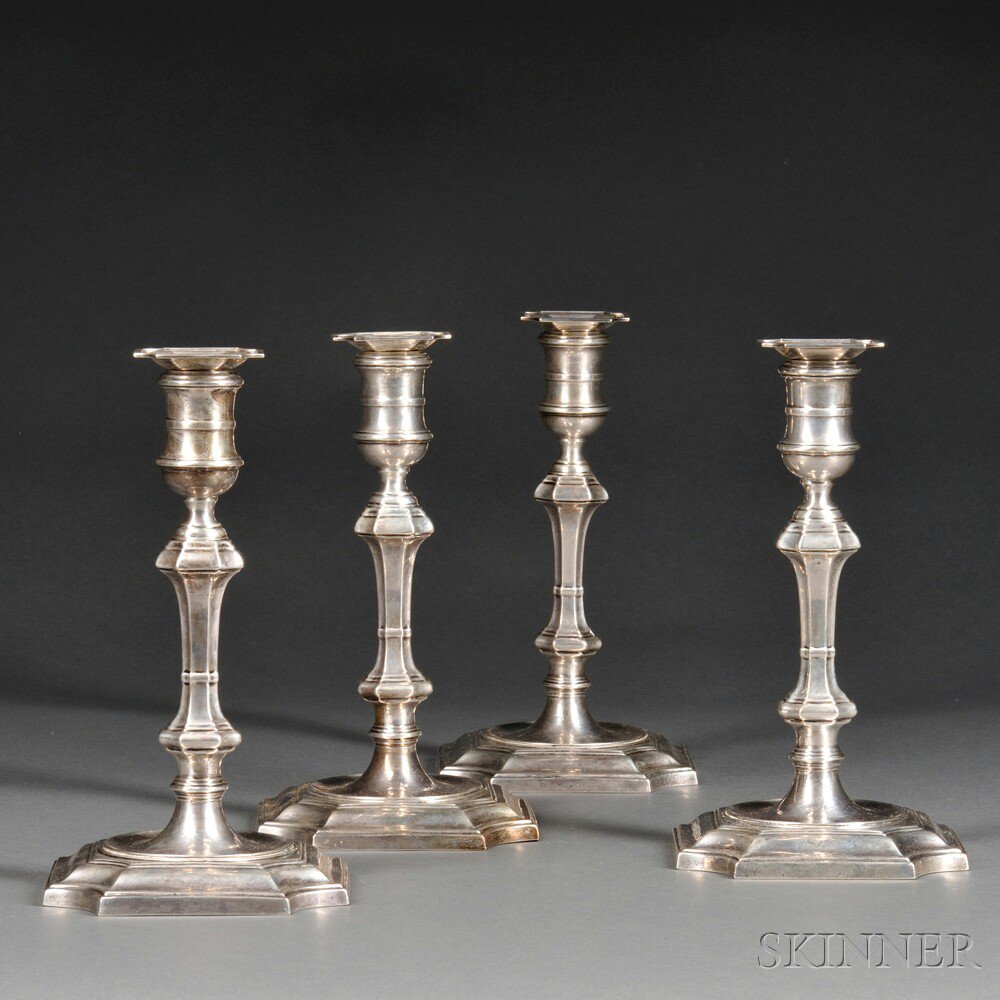 Appraisal: Four Cartier Georgian-style Sterling Silver Weighted Candlesticks th century each