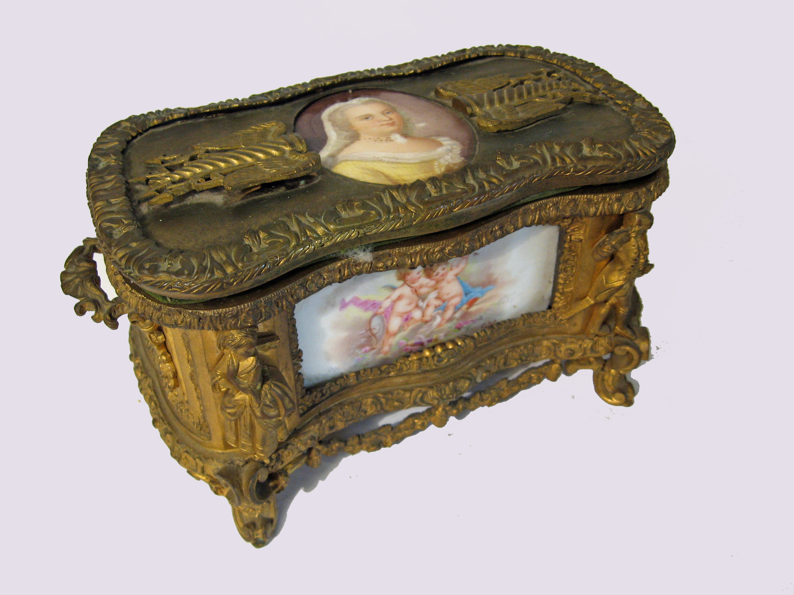 Appraisal: French gilt-bronze and porcelain inset jewelry box late th century