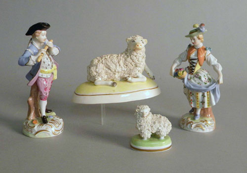 Appraisal: Two Dresden figurines h together with a Dresden lamb h