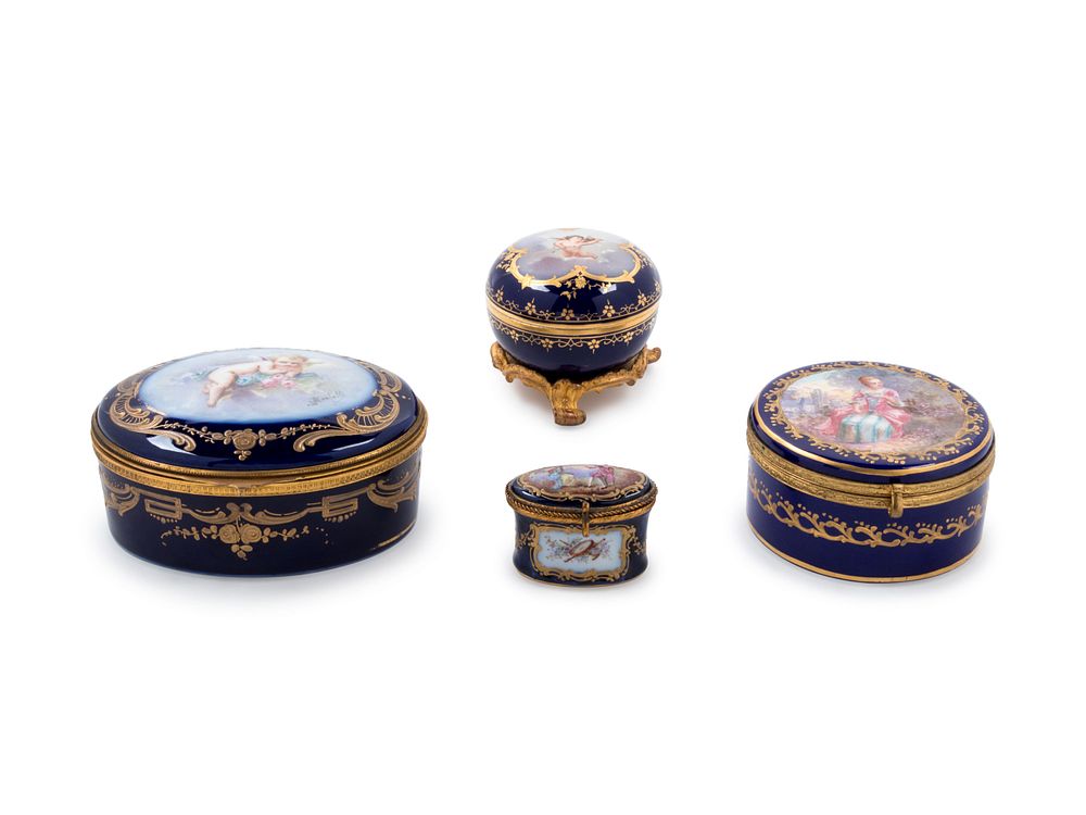 Appraisal: Four Sevres Style Painted and Parcel Gilt Porcelain Boxes Four