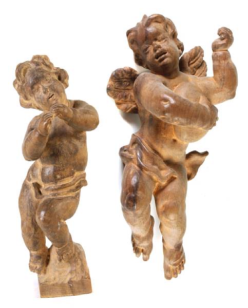 Appraisal: A group of carved wood putti height in width in