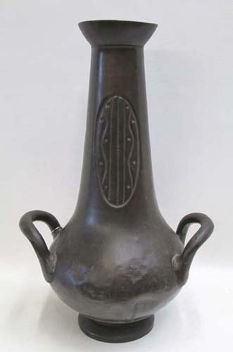 Appraisal: HAMMERED COPPER VASE having bulbous form base with tapering neck