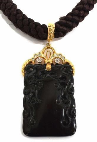 Appraisal: Estate Chinese black jade pendant and woven hair necklace removable