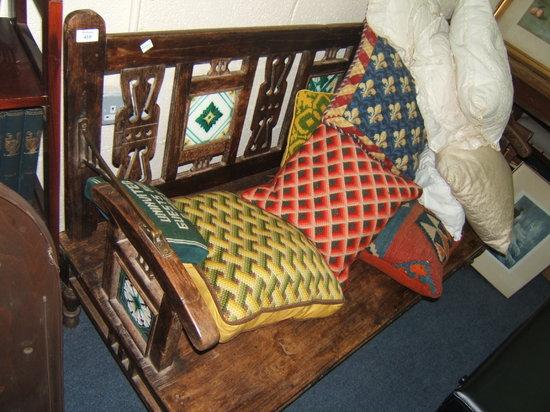 Appraisal: A Colonial hardwood bench with pierced tile set fold over