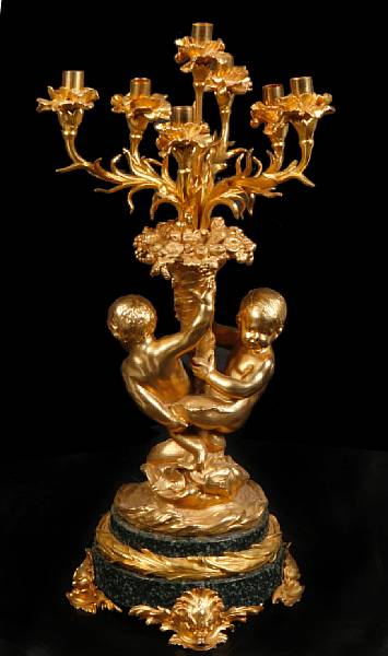 Appraisal: A pair of gilt bronze and marble figural seven light