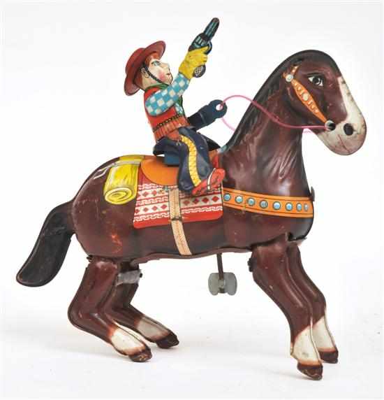 Appraisal: HAJI OF JAPAN TINPLATE GALLOPING COWBOY Japanese circa s with