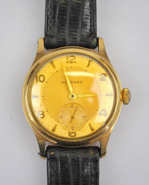 Appraisal: A gentleman's ct wristwatch with gilt dial retailed by Garrard