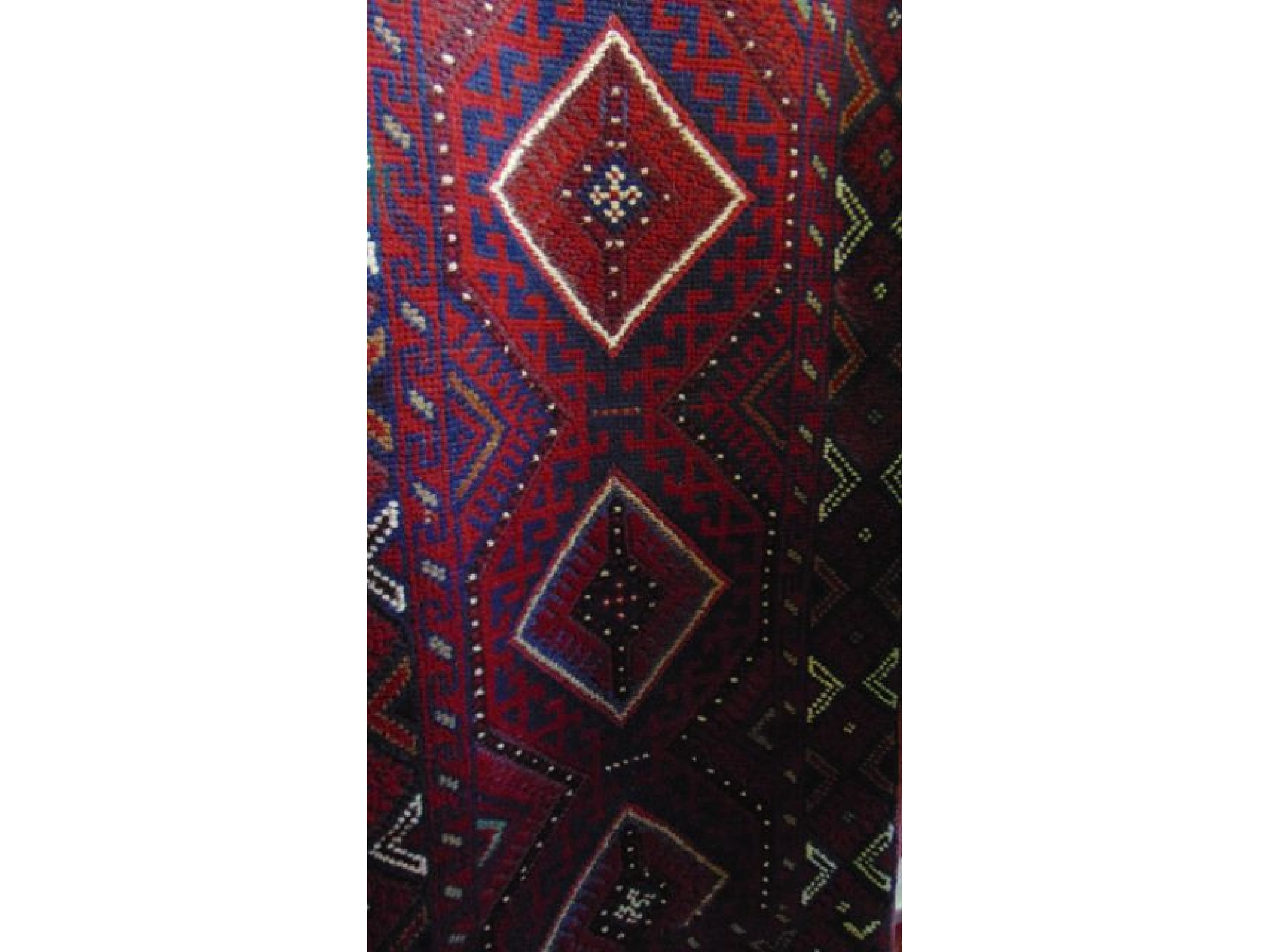 Appraisal: An eastern wool runner principally in a red and blue