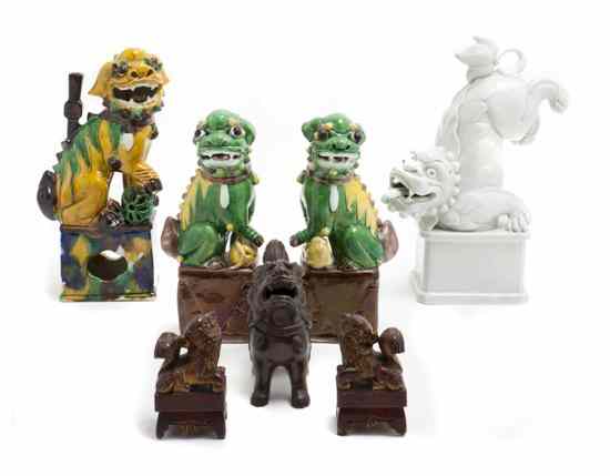 Appraisal: Seven Chinese Figures of Fu Dogs comprising four porcelain examples