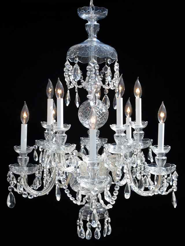 Appraisal: ELEGANT LIGHT CRYSTAL CHANDELIER Draping crystal chains and faceted pear