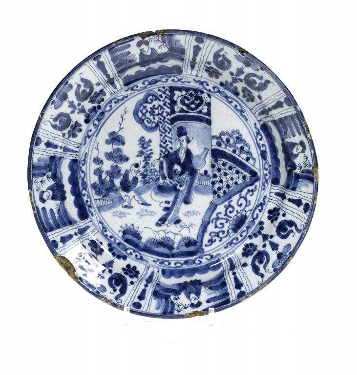 Appraisal: A DUTCH DELFTWARE DISH painted in shades of cobalt in