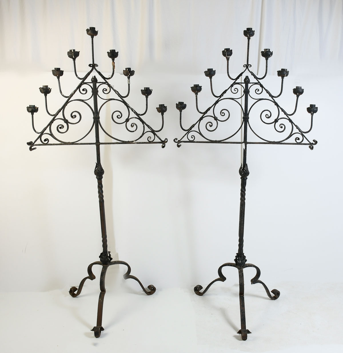 Appraisal: PAIR OF WROUGHT IRON FLOOR TORCHIERES Pair of tall hand-forged