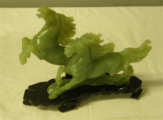 Appraisal: th Century jade figure of two galloping horses w in