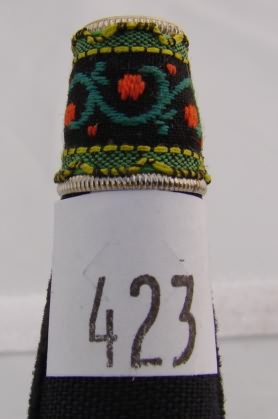 Appraisal: Austrian small thimble with embroidered fabric with orange flowers