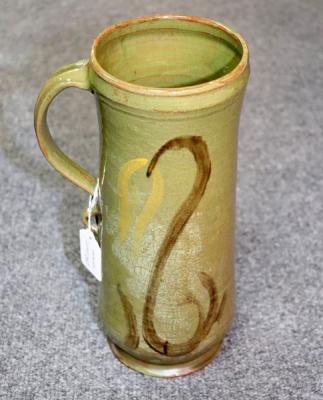 Appraisal: Ivan Martin Cricklade Pottery a tall cylindrical vase with handle