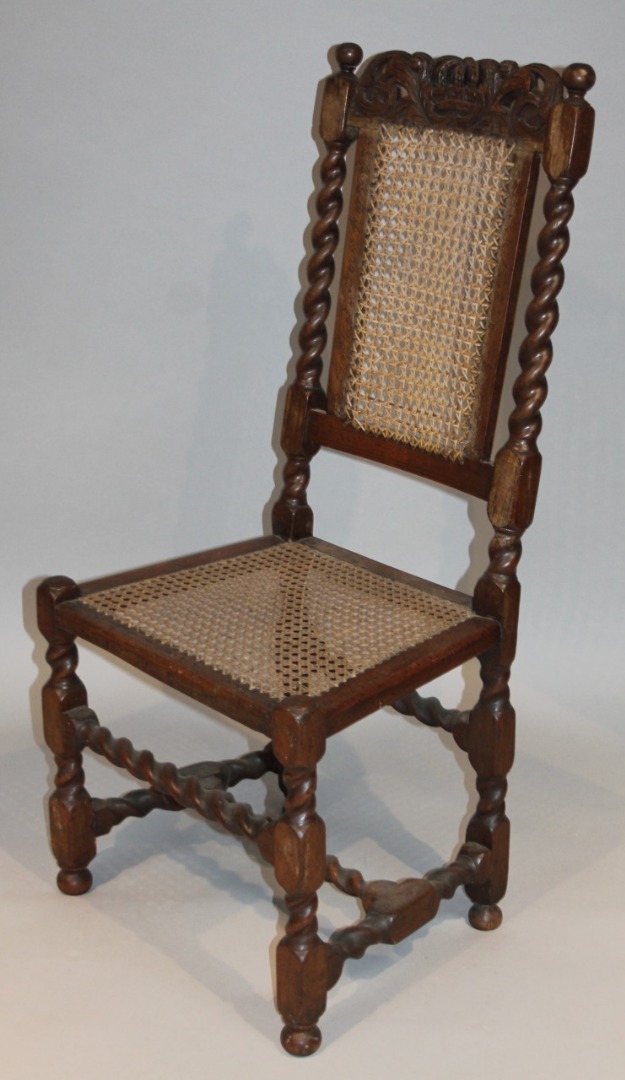 Appraisal: An thC walnut Carolean berger dining chair with shaped floral