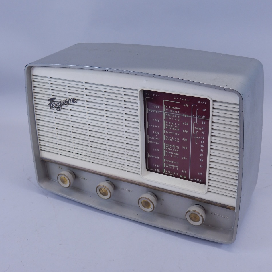 Appraisal: A Ferguson silver Bakelite radio model U cm wide