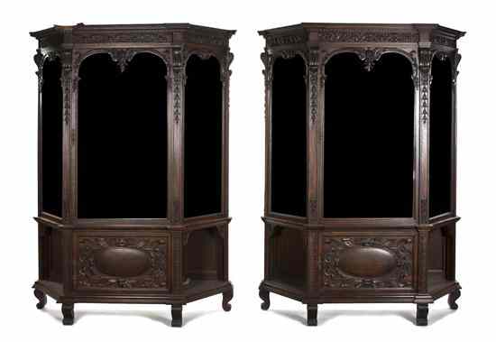 Appraisal: A Pair of Renaissance Revival Carved Oak Vitrines each of