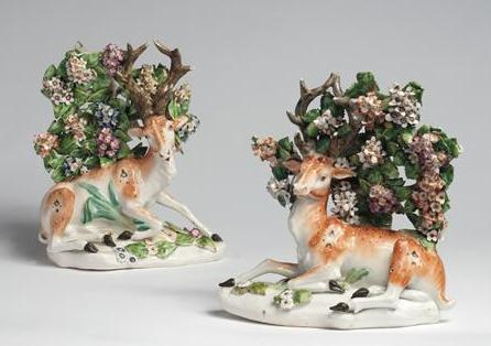 Appraisal: ASSEMBLED PAIR OF DERBY PORCELAIN FIGURES OF STAGS AT LODGE