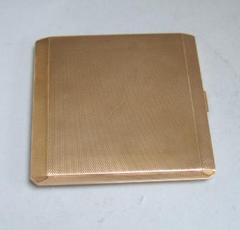 Appraisal: A ct gold rectangular cigarette case the exterior with engine