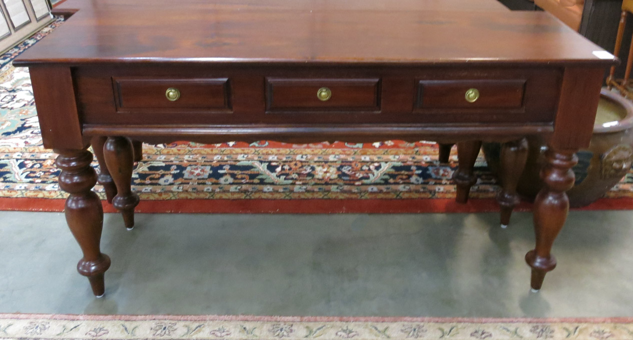 Appraisal: MAHOGANY COLONIAL REVIVAL SOFA TABLE the long rectangular top over