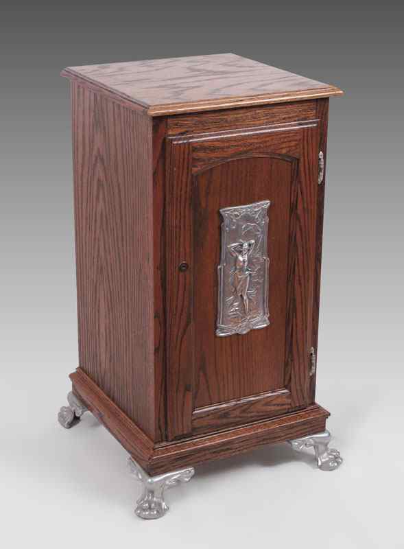 Appraisal: ART NOUVEAU OAK SLOT MACHINE STAND Single door with single