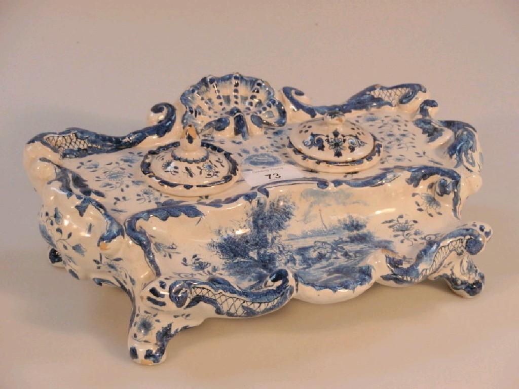 Appraisal: A thC Dutch Delft desk stand of rococo form and