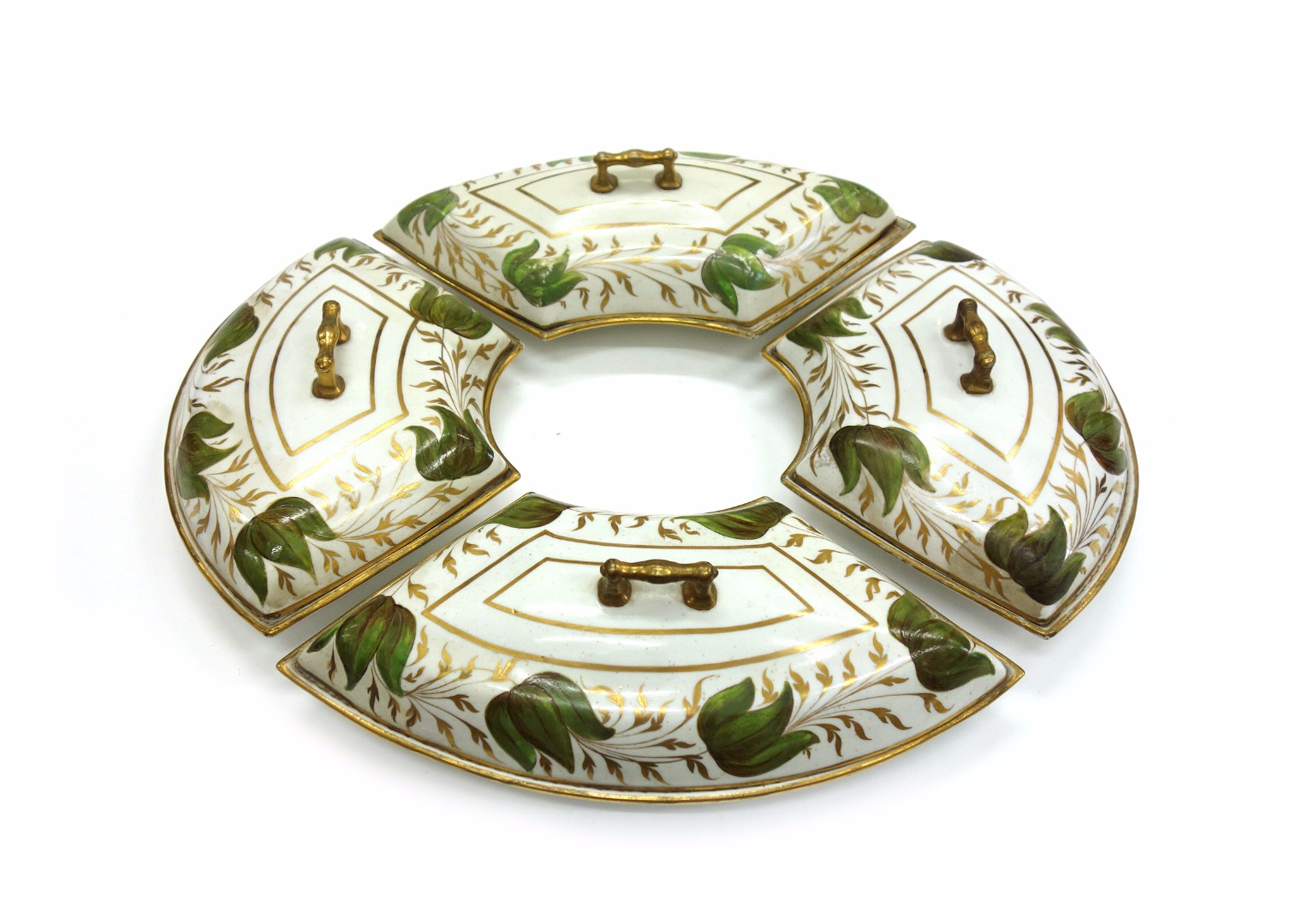 Appraisal: An English porcelain supper set circa the four segmented dishes