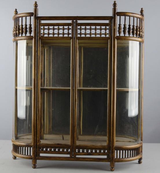 Appraisal: Free Standing Stick And Ball Display Showcase Small hutch with