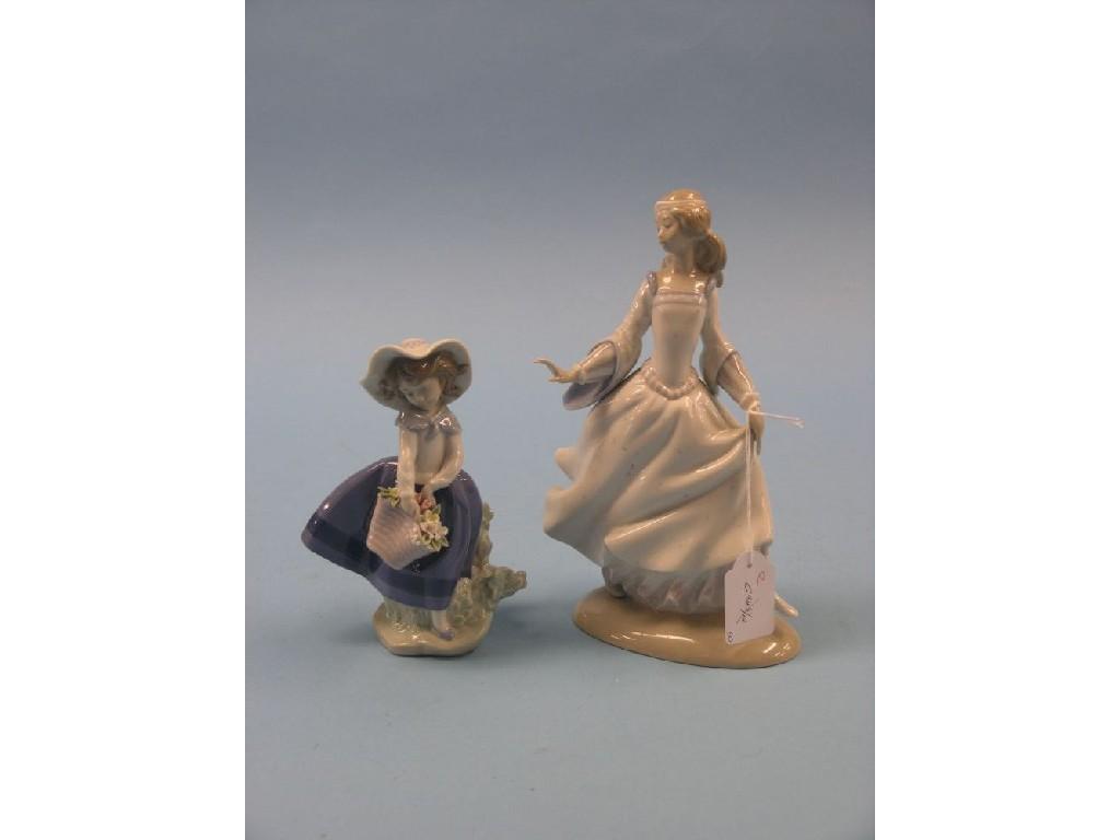 Appraisal: A Lladro porcelain figure Pretty Pickings boxed and another Cinderella