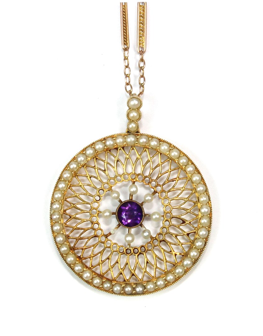 Appraisal: A gold amethyst and seed pearl set pendant in a