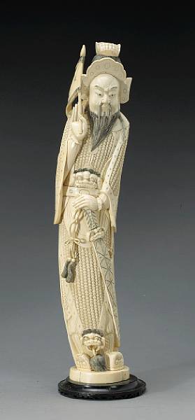 Appraisal: A tinted ivory figure of a warrior general th Century