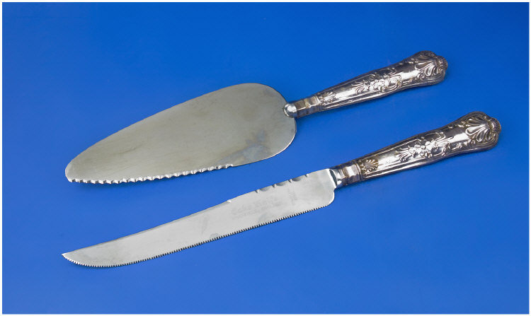 Appraisal: Silver Handled Cake Server hallmark Sheffield plus silver handled bread