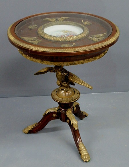 Appraisal: French style mahogany end table with a glass topped inset