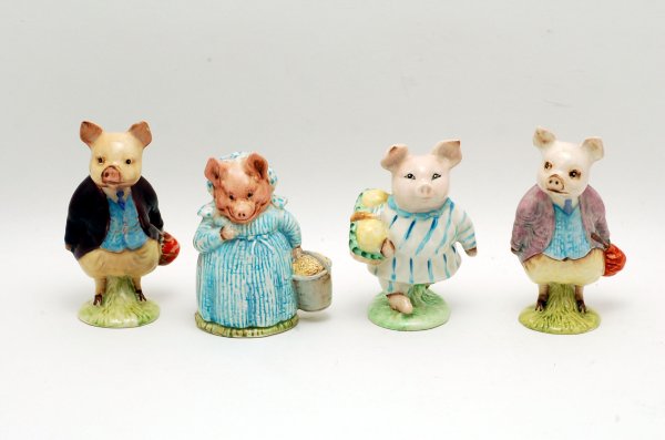 Appraisal: Four Beatrix Potter Beswick pig figurines Aunt Pettitoes F Warne