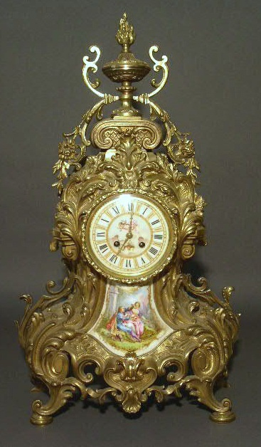 Appraisal: French brass mantel clock with porcelain face and panel h