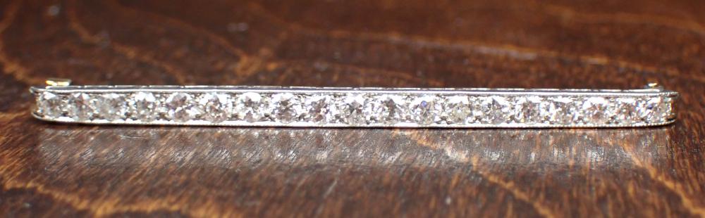 Appraisal: ESTATE DIAMOND AND PLATINUM BAR PIN The platinum pin with