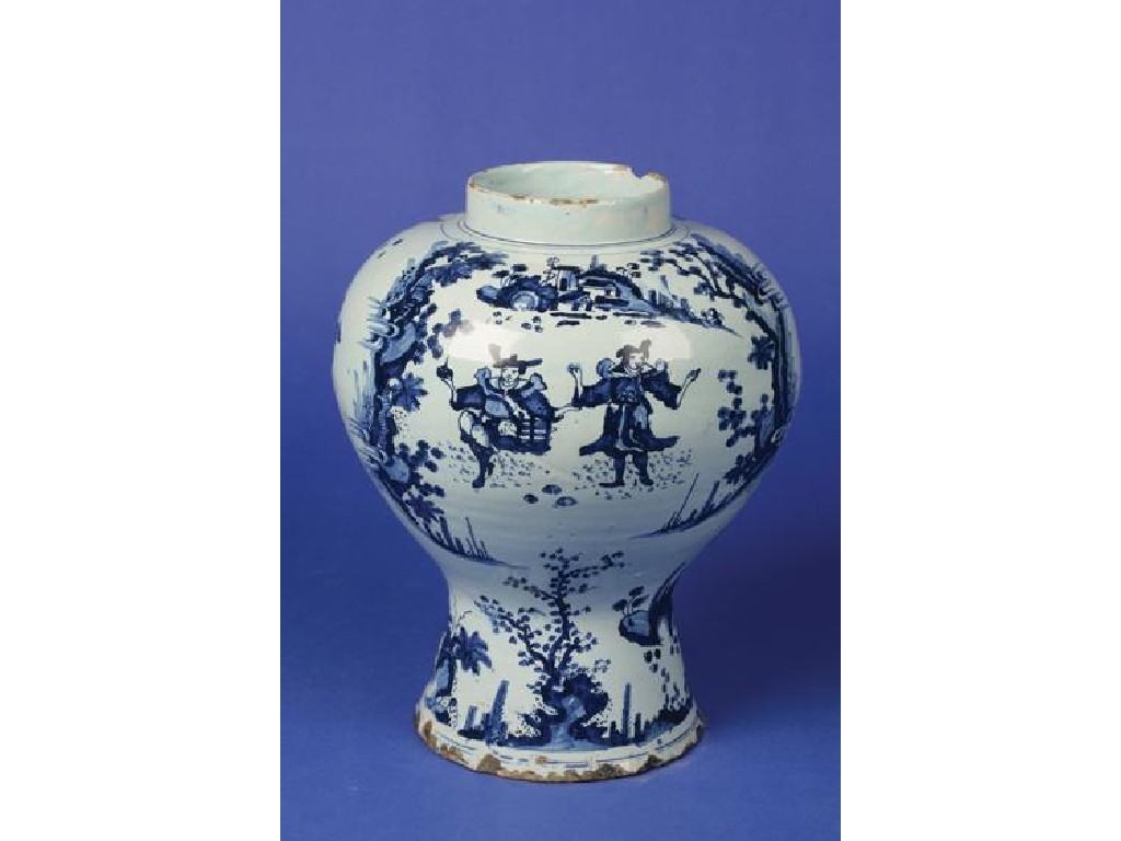 Appraisal: A DELFTWARE BLUE AND WHITE VASE of waisted baluster form