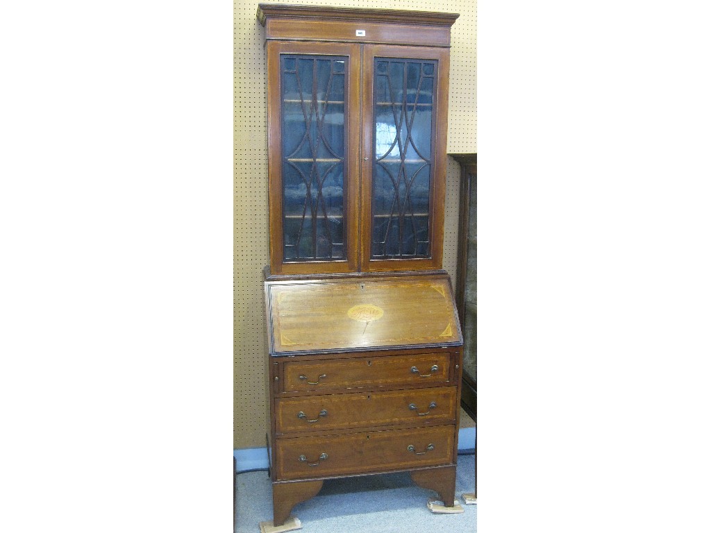 Appraisal: Edwardian mahogany inlaid and crossbanded bureau bookcase