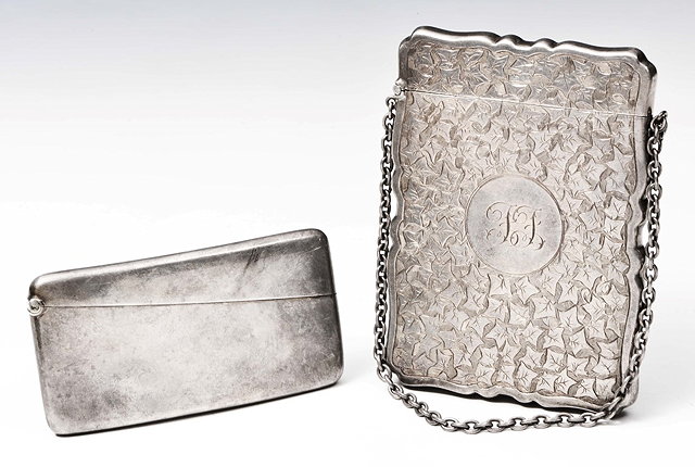 Appraisal: AN EDWARDIAN SILVER CARD CASE with shaped sides and all