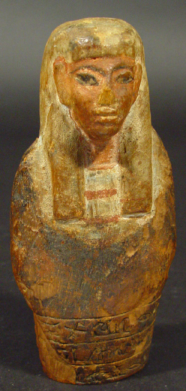 Appraisal: Egyptian style carved wooden figure with painted decoration and carved