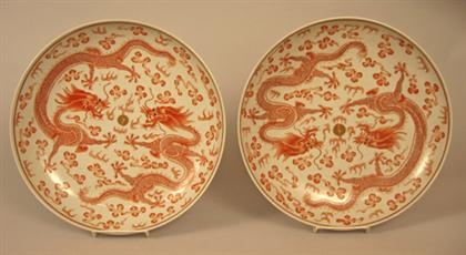 Appraisal: Pair of Chinese porcelain and iron-red decorated 'dragon' chargers red