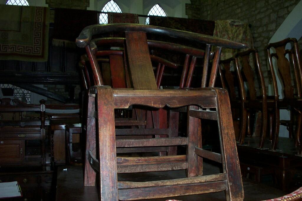 Appraisal: A set of four Chinese elbow chairs with horseshoe shaped