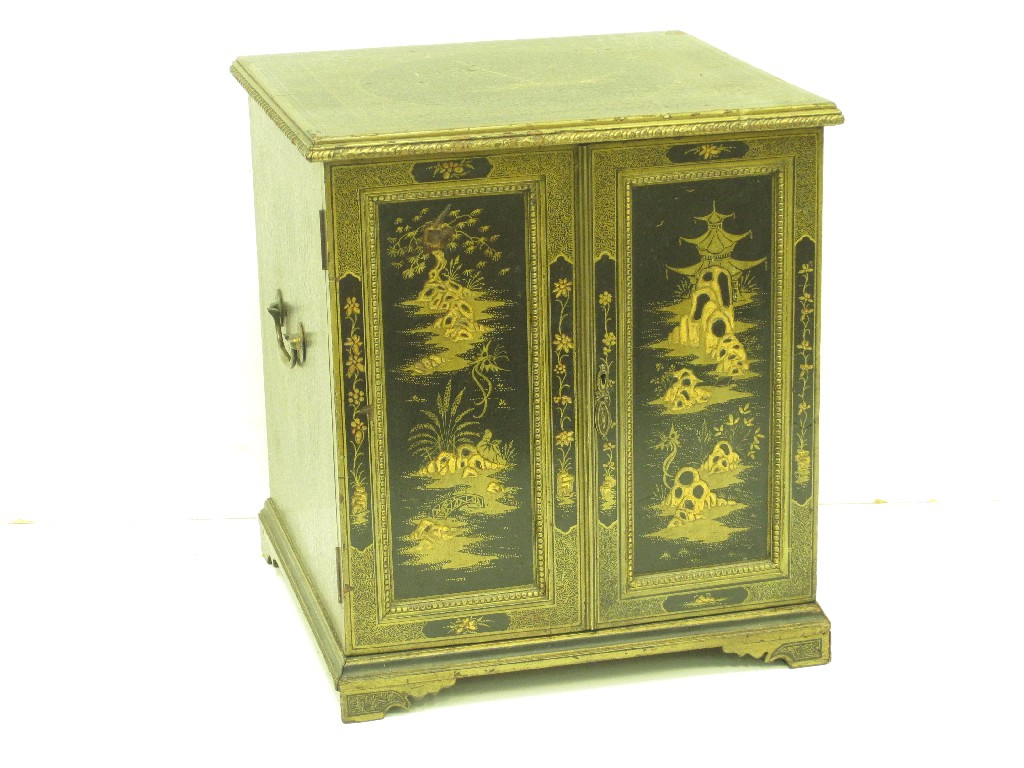 Appraisal: A th Century black lacquered Collector's Cabinet with gilt chinoiserie