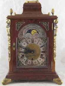 Appraisal: A Westminster chime day mantel clock with moonphase x x